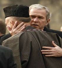 U.S. President George W. Bush embraces Afghan President Hamid ...